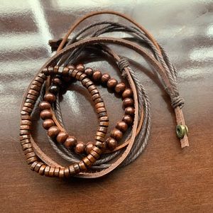 3 bracelets, 2 beaded and 1 leather